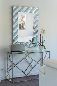 Suites Mana - Le Manaloft, Chic et moderne avec salle privée de Fitness en plein centre-ville de Rethel