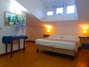 Double Room - Attic room in Hotel Danubio