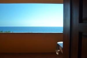 Il Tramonto - appartamento in prima fila, fronte spiaggia con vista mare panoramica -