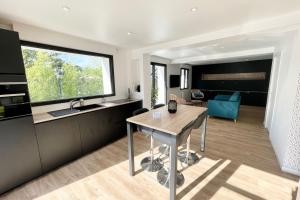 Appartements T2 neuf Hyper Design - Jacuzzi - Proche plages : photos des chambres