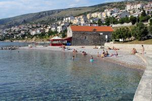Apartments with a parking space Senj - 5572