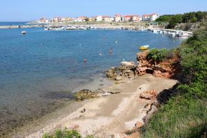 Apartments with a parking space Povljana, Pag - 6296 