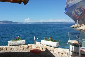 Apartments with parking space Novi Vinodolski - 15823