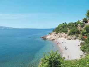 Apartments with a parking space Senj - 15376 