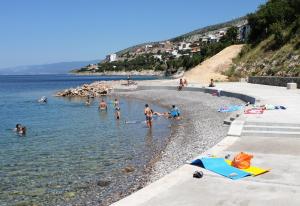 Apartments with a parking space Senj - 16364