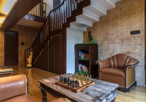 SaffronStays Urja, Lonavala - Private villa with 2 pools, spa room, private elevator & waterfall