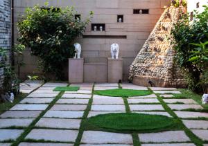 SaffronStays Urja, Lonavala - Private villa with 2 pools, spa room, private elevator & waterfall