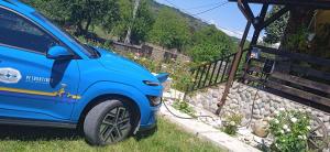 Pensiunea Gradinarilor cu statie de încărcare încărcare electrică auto