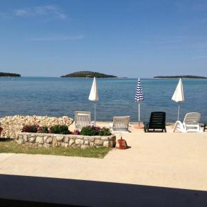 Family friendly seaside apartments Krapanj, Sibenik - 18004