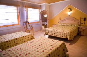 Quadruple Room room in Hostal la Campana
