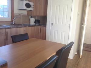 Appin Holiday Homes -Caravans, Lodges, Shepherds Hut and Train Carriage stays