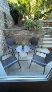 Appartements Au jardin de la Basilique : photos des chambres