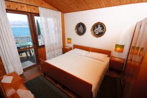 Two-Bedroom Apartment with Terrace and Sea View room in Family friendly seaside apartments Arbanija Ciovo - 5220