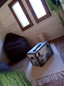 Maisons de vacances La tiny house exigue IJ : photos des chambres