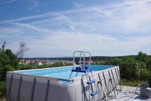 Family friendly apartments with a swimming pool Barbat, Rab - 4988 