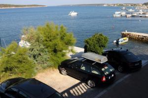 Apartments by the sea Barbat, Rab - 4975