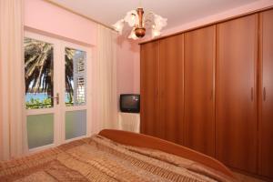 Apartments by the sea Barbat, Rab - 4978