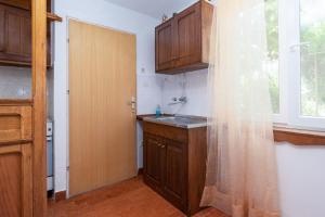 Apartments by the sea Barbat, Rab - 4977