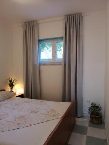 Apartments with parking space Banjol, Rab - 5071