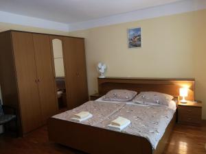 Apartments with parking space Kampor, Rab - 5032