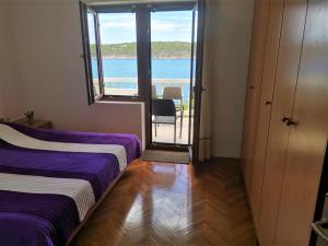Apartments by the sea Barbat, Rab - 4975