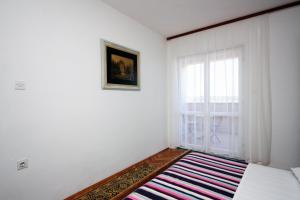 Apartments and rooms with parking space Barbat, Rab - 5070
