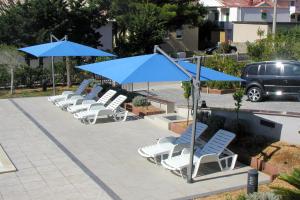 Seaside apartments with a swimming pool Barbat, Rab - 4980