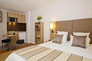 Appart'hotels Sejours & Affaires Strasbourg Kleber : photos des chambres