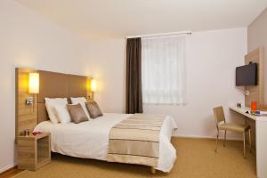 Appart'hotels Sejours & Affaires Strasbourg Kleber : photos des chambres