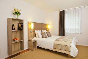 Appart'hotels Sejours & Affaires Strasbourg Kleber : photos des chambres