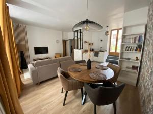 Appartements L'Ilot du Perche: Appartement cosy avec jardin : photos des chambres