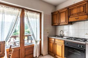 La finestra sul Lago Tenna Ospitar