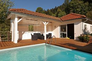 Chalets LE CHALET BLANC - JACUZZI / PISCINE / SAUNA : photos des chambres