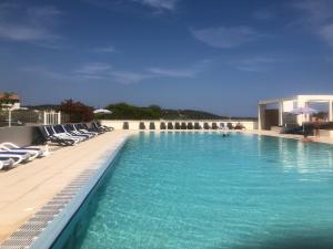 Maisons de vacances Charmante petite maison dans residence avec piscine chauffee a 600 m de la plage : photos des chambres