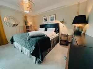 Pieni lomahuoneisto ja ulkoporeallas - Pahajoki