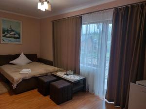 Two-Bedroom Apartment room in Pyate Koleso