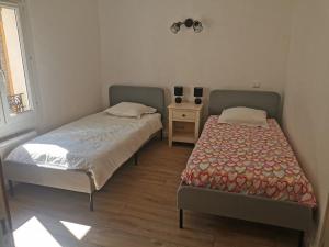 Appartements La suite du beffroi : photos des chambres