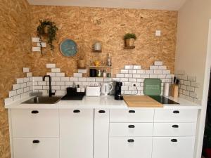 Appartements L'Herbeaudhier - Les Suites : photos des chambres