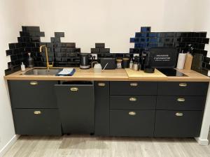 Appartements L'Herbeaudhier - Les Suites : photos des chambres