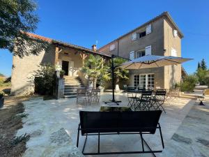 Maisons d'hotes O Trois Puits : photos des chambres