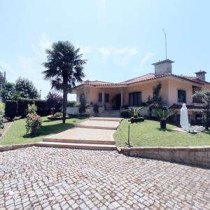 obrázek - Casa Além Rio - quartos para 6 hóspedes em Santo Tirso