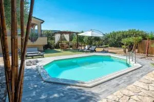 Villa Pedra Alghero - appartamento in villa con piscina - Putifigari