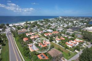 Tropical luxury pool home by the beach with roof top lounge centrally located on Anna Maria Island
