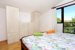 Apartments by the sea Arbanija, Ciovo - 10340