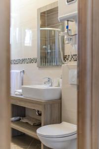 Seaside apartments with a swimming pool Rastici, Ciovo - 11092