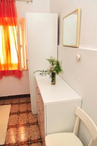 Seaside apartments with a swimming pool Supetar, Brac - 11360