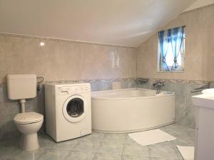Apartments with a swimming pool Banjol Rab 11382