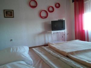 Apartments by the sea Kampor, Rab - 11407