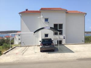 Apartments with a parking space Barbat, Rab - 11532 