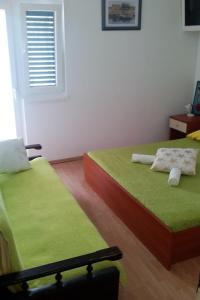 Apartments by the sea Drvenik Donja vala, Makarska - 11553